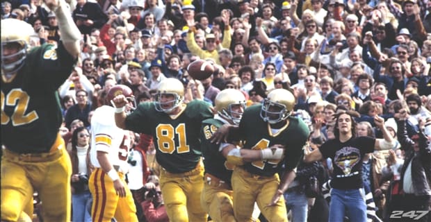 Dave Mitchell (44) celebrates with teammates after scoring the opening touchdown versus USC in 1977.