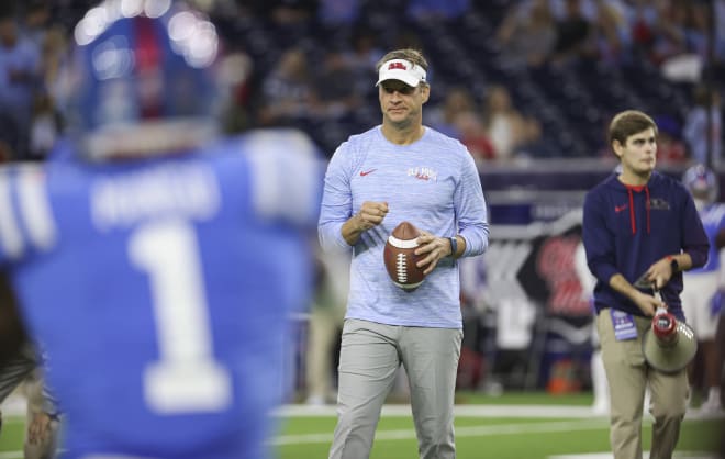 Ole Miss coach Lane Kiffin looks on prior to Wednesday's TaxAct Texas Bowl versus Texas Tech. 