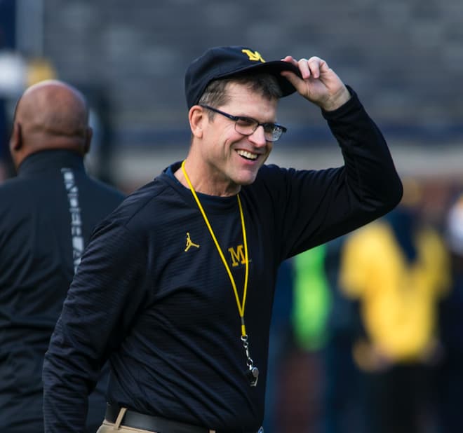 Michigan Wolverines football head coach Jim Harbaugh is fired up for fall camp. 