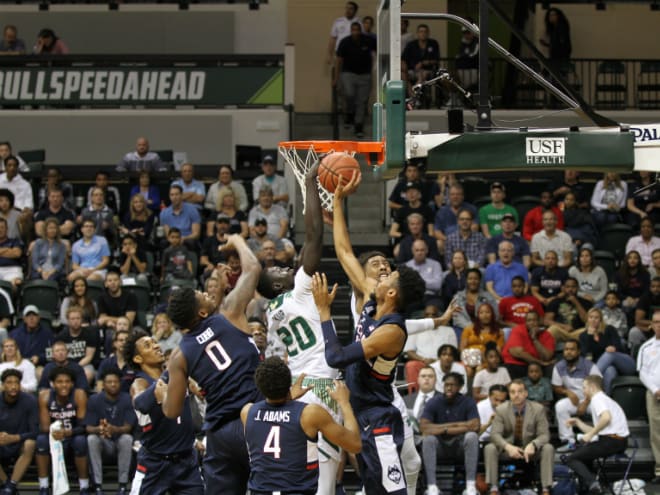 Mayan Kiir (20) blocks a UConn shot attempt during the first half in the Yuengling Center last season.