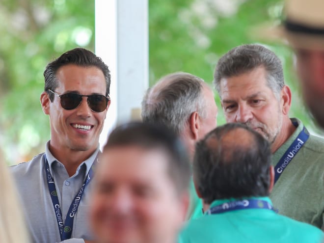 Former Notre Dame quarterback Brady Quinn, left, attended the Golic Sub-Par Classic charity event on Notre Dame's campus Sunday and Monday.