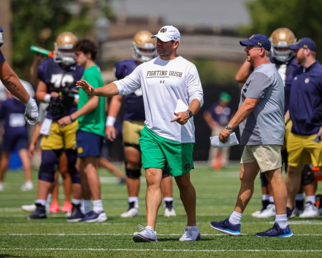 Notre Dame tight ends coach Gerad Parker (center) is expected to be named the next Irish offensive coordinator.