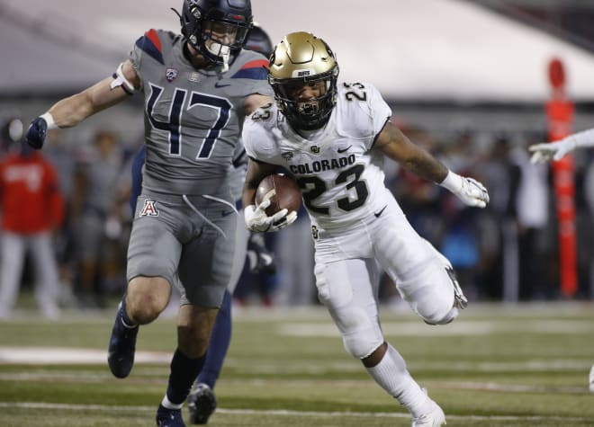 Jarek Broussard evades an Arizona defender during a 24-13 win over the Wildcats on Dec. 5. 