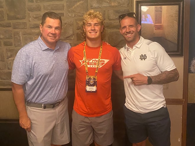 2024 class four-star LB Sammy Brown spent time with defensive coordinator Al Golden (left) and graduate assistant James Laurinaitis (right).