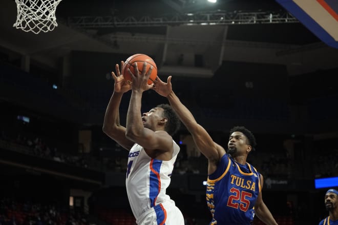 Boise State's Abu Kigab goes up for a basket Friday night against Tulsa in Extra Mile Arena.