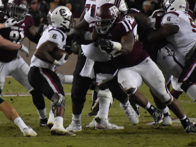 Justin Madubuike and the Aggie defense dominated.