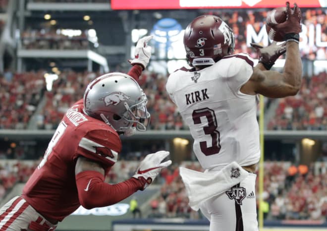 Texas A&M's Christian Kirk hauls in what would be the game-winning touchdown in overtime