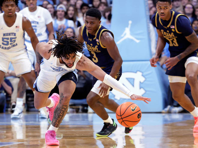 North Carolina's RJ Davis steals the ball from Notre Dame's Markus Burton in the first half of UNC's 84-51 win over ND.