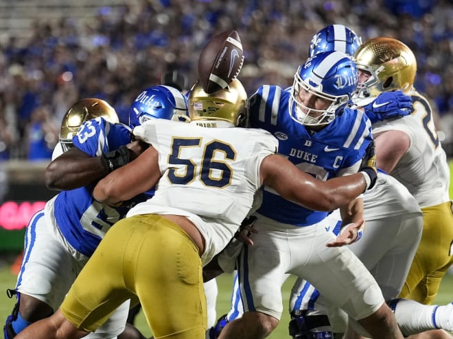 Notre Dame nose tackle Howard Cross III has been a menace for opposing quarterbacks, including Duke's Riley Leonard, pictured fumbling in ND's 21-14 victory on Sept. 30.