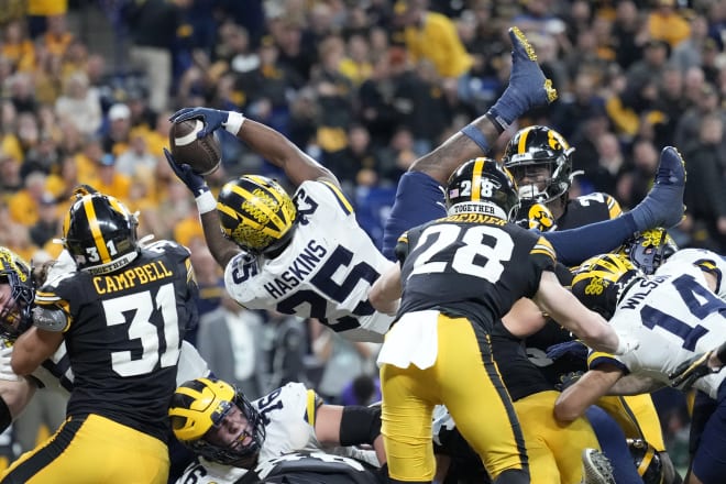 Running back Hassan Haskins scored two touchdowns for Michigan in its 42-3 win over Iowa on Saturday.