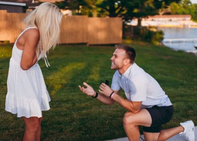 Brad Davison proposes to Tyra Buss in front of friends and family in the Wisconsin Dells in Summer 2021.