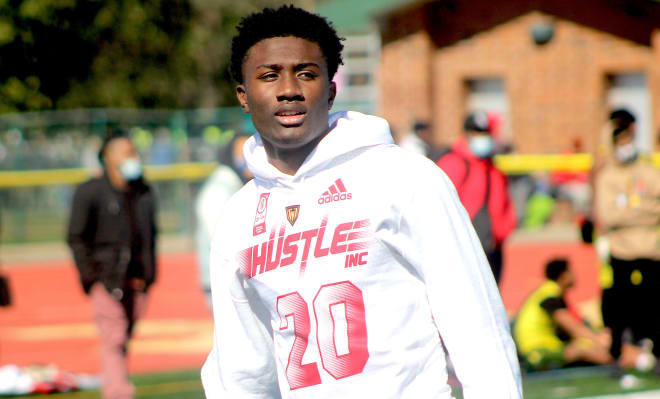 Georgia defensive back Marcus Allen holds a Michigan Wolverines football recruiting offer, Jim Harbaugh.