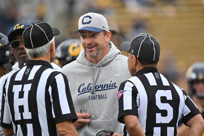 Cal head coach Justin Wilcox talks with the officials during Saturday's win over Arizona State.