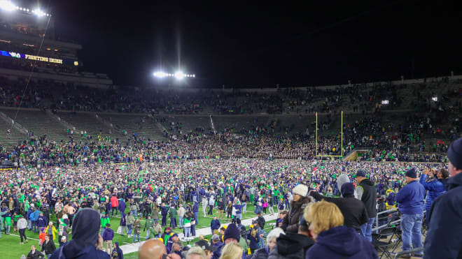 Irish fans storm the field at Notre Dame Stadium Saturday night after ND's 35-14 takedown of No. 4 Clemson.