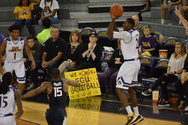 Caleb White launches in three of his game high 28 points in East Carolina's 66-62 win over UConn.