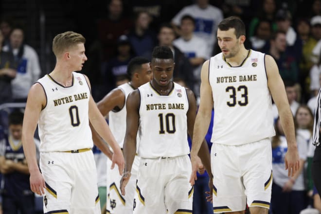 Rex Pflueger (0), T.J. Gibbs (10) and John Mooney (33) provide the "old" look head coach Mike Brey always wants.