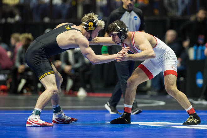 Iowa's Max Murin engages Cornell's Yianni Diakomihalis in the NCAA Tournament quarterfinals. 