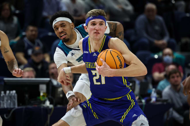 Andrew Carr, here shielding the ball from UNC Wilmington's James Baker during the CAA championship game, committed to Wake Forest on Monday night. 