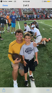 Drew Lock poses with Marshall Manning at Peyton's camp.