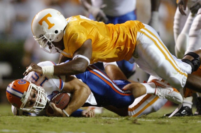 Tennessee's Jerod Mayo takes down Florida quarterback Tim Tebow on Saturday at Neyland Stadium.