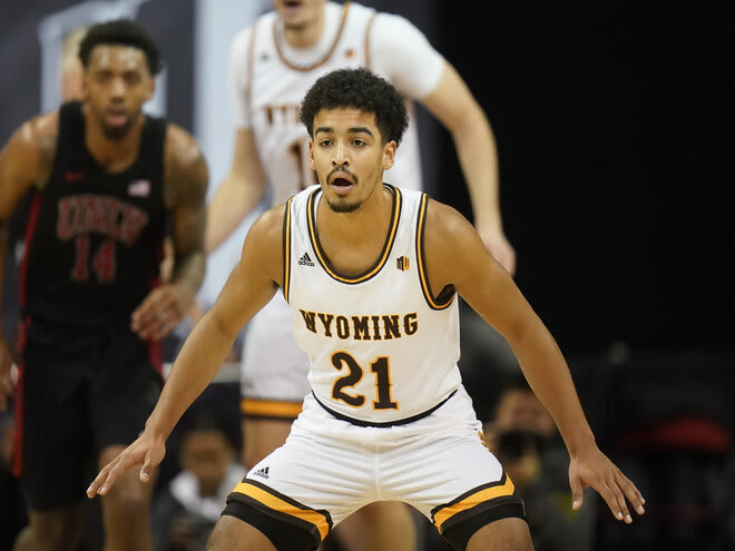 Wyoming guard Noah Reynolds (21) defends against UNLV during the 2022 Mountain West Conference quarterfinals.