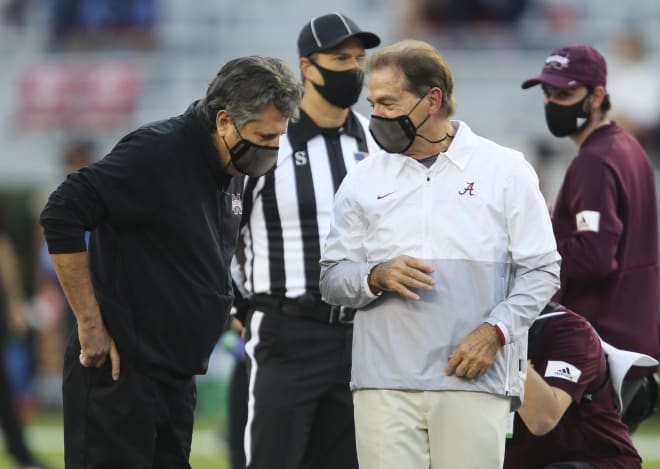 Mississippi State head coach Mike Leach and Alabama head coach Nick Saban talk before the game at Bryant-Denny Stadium. Photo | Imagn
