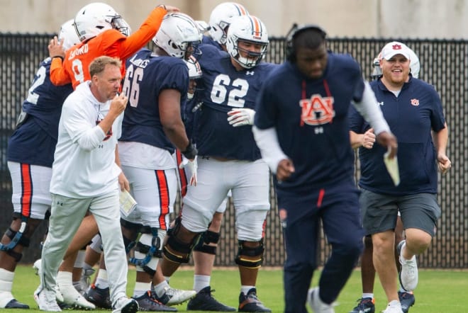 Auburn Tigers head coach Hugh Freeze breaks huddle during Auburn Tigers football practice.