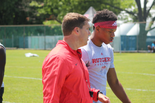Jennings talks with RU head coach Chris Ash at a recent camp