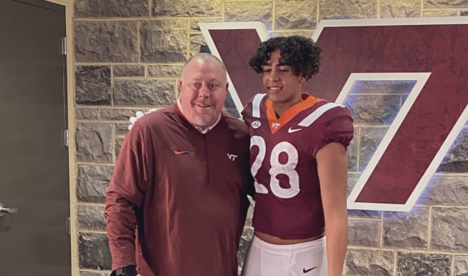 Nichols poses for a photo with DL coach JC Price on his visit