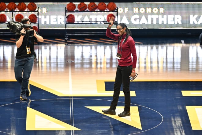 Former Notre Dame star Katryna Gaither waves to the Purcell Pavilion crowd Sunday during her Ring of Honor ceremony.