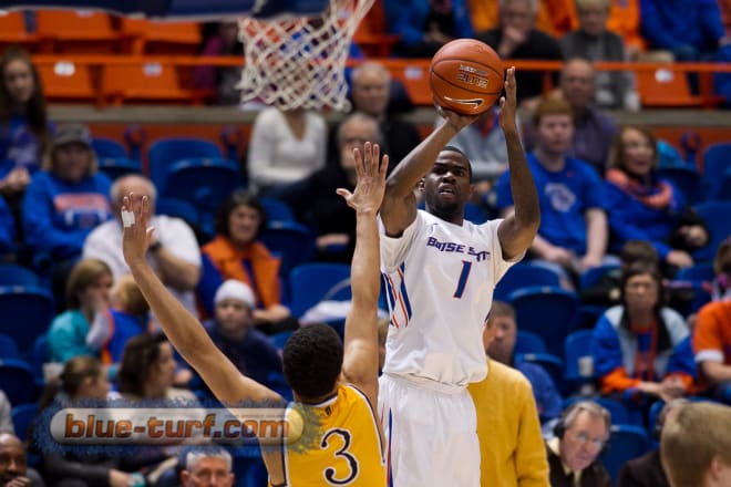 Boise State's Mikey Thompson (1) goes up for a 3 pointer during first half action against the Wyoming Cowboys in Taco Bell Arena. The broncos defeated the Cowboys 94-71. 