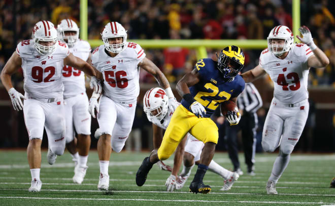 Senior running back Karan Higdon's out-rushed Wisconsin's Jonathan Taylor on Saturday, 105-101.