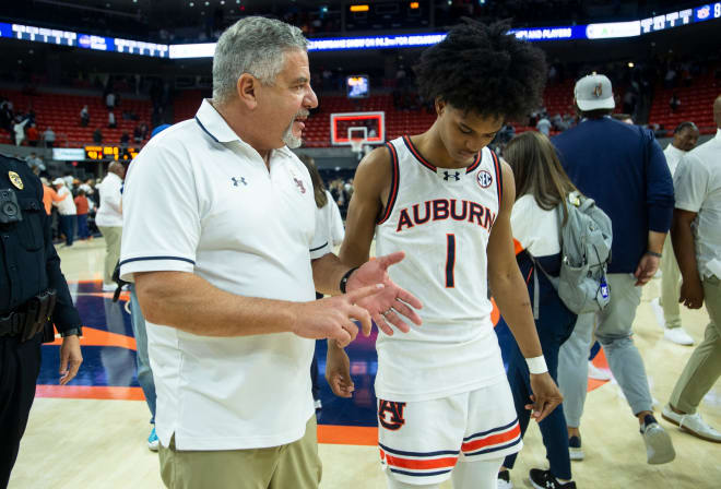 Auburn Tigers head coach Bruce Pearl talks with guard Aden Holloway (1) after the game as Auburn Tigers take on LSU Tigers at Neville Arena in Auburn, Ala., on Saturday, Jan. 13, 2024. Auburn Tigers defeated LSU Tigers 93-78.