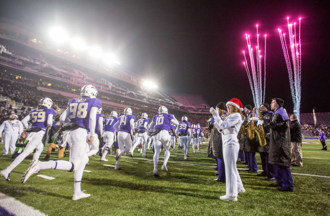 James Madison players take the field prior to the Dukes' win over Weber State in the FCS semifinals in December at Bridgeforth Stadium.