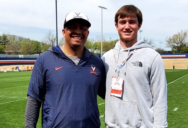 Simpsonville (SC) Hillcrest quarterback Bennett Judy got to meet new UVa coach Tony Elliott for the first time at Wednesday's practice.