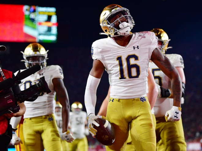 Sophomore wide receiver Deion Colzie celebrates after scoring his first career touchdown. 