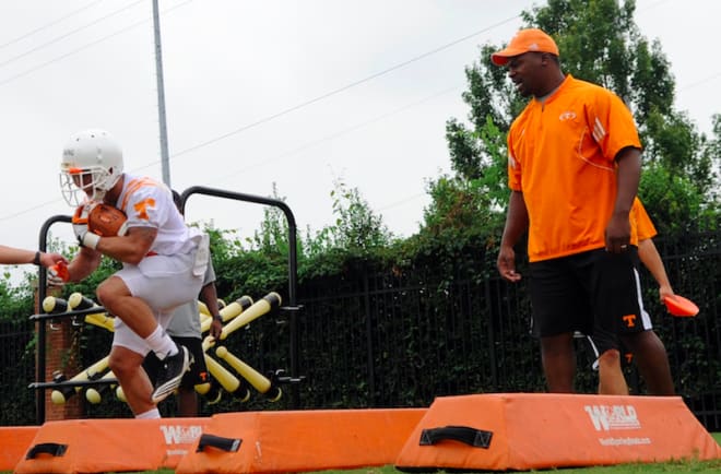 Jay Graham, left, coaches running backs while at Tennessee last season. Photo | Imagn