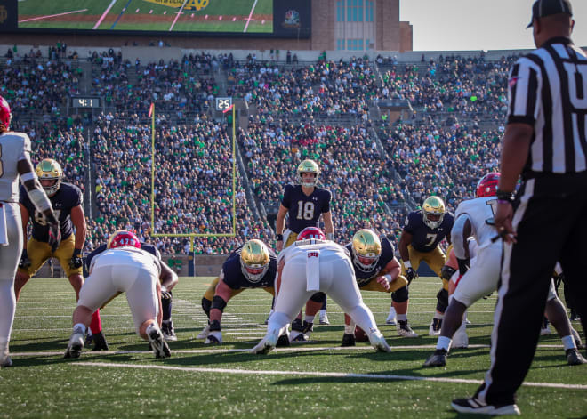 Notre Dame freshman quarterback Steve Angeli lines up for his first collegiate play. Saturday against UNLV.