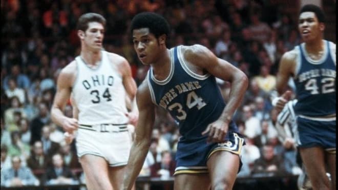 Former Notre Dame basketball players Austin Carr (34) and Collis Jones (42)