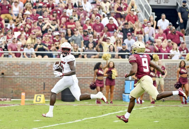 Louisville Cardinals wide receiver Tyler Harrell (8) scores a touchdown during the first quarter at Doak S. Campbell Stadium. Photo | Melina Myers-USA TODAY Sports