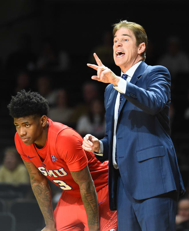 Kendric Davis (left), Tim Jankovich and the SMU Mustangs beat Temple, 79-71, Wednesday afternoon.