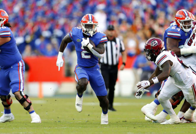 Florida running back Montrell Johnson Jr. (2) runs up the field against South Carolina during the first half of an NCAA college football game, Saturday, Nov. 12, 2022, in Gainesville, Fla. (AP Photo/Matt Stamey)