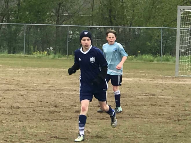 It was freezing today in Southaven, Miss., as Carson (navy blue) and his North Mississippi Soccer Academy team faced Hernando. NMSA won, 2-0. I've never been happier to get into a heated vehicle in my life. Soccer fields are the coldest tracts of land on earth. That's a scientific fact. 