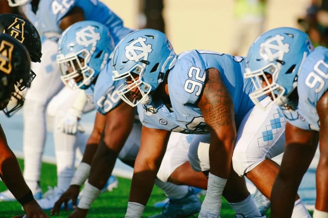 Crawford (92) is leading UNC's defensive line.