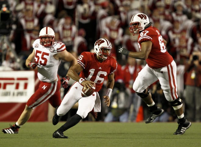 Josh Oglesby (67) looks to block for quarterback Russell Wilson during Wisconsin's 48-17 victory over Nebraska in 2011.