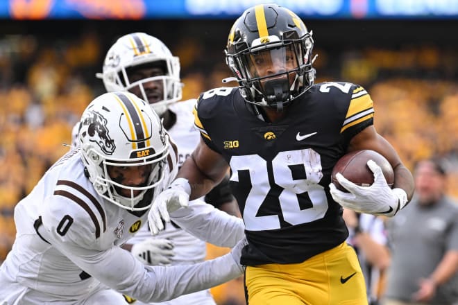 Iowa running back Kamari Moulton rushes for a first down against Western Michigan in 2023.