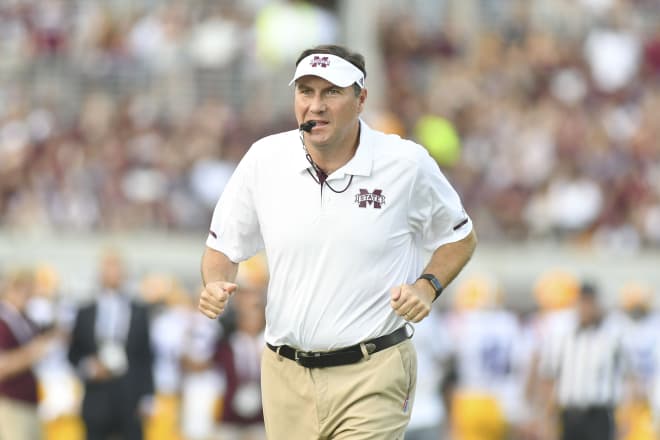 Sep 16, 2017; Starkville, MS, USA; Mississippi State Bulldogs head coach Dan Mullen runs off the field before the game against the LSU Tigers at Davis Wade Stadium. 