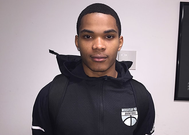 Hickory (N.C.) Moravian Prep reclassified senior guard Shakeel Moore had some of the top dunks at the John Wall Holiday Invitational.