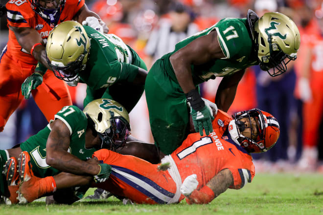 Logan Berryhill and Jhalyn Shuler drop Cuse RB LeQuint Allen for a loss