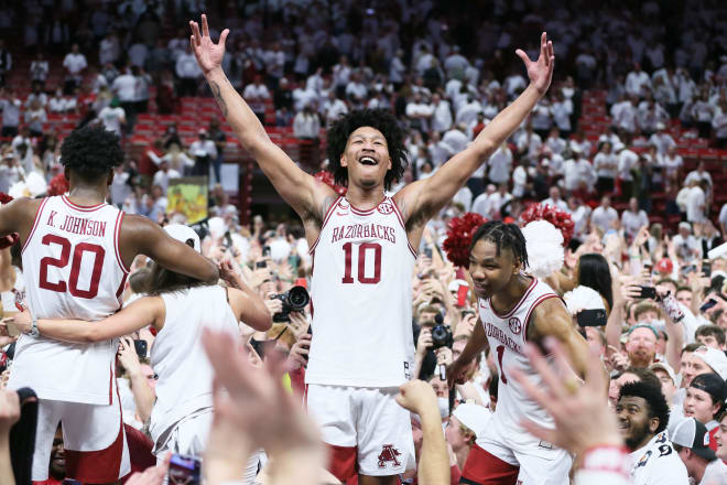 Jaylin Williams and his teammates celebrate amongst the fans Tuesday night.